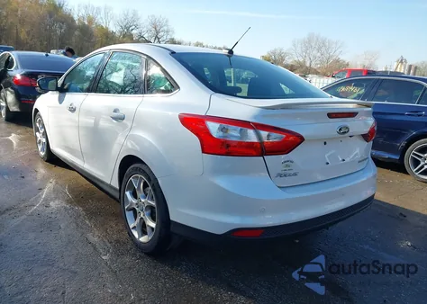 2012 Ford Focus Titanium z USA, uszkodzony, nr VIN 1FAHP3J20CL102648